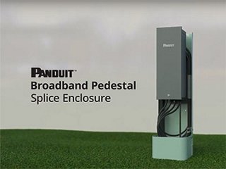 green pedestal with the cover removed, showing a fiber splice enclosure with the words broadband pedestal splice enclosure