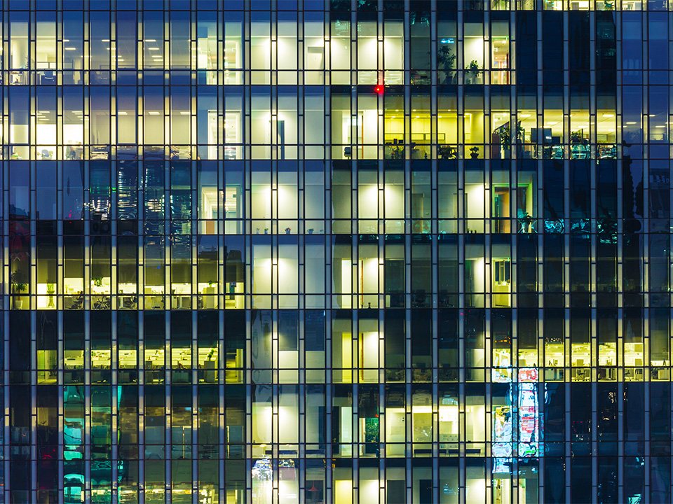 Modern office building at night
