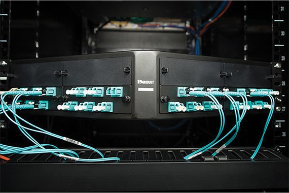 an angled patch panel installed at the santa margarita water district with fiber patch cords