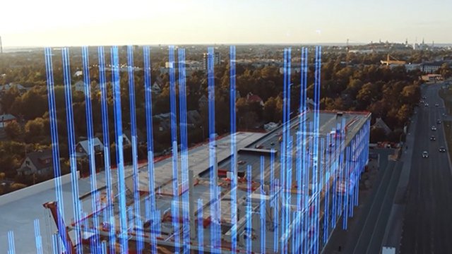 A building under construction, with superimposed lines showing how the building will develop