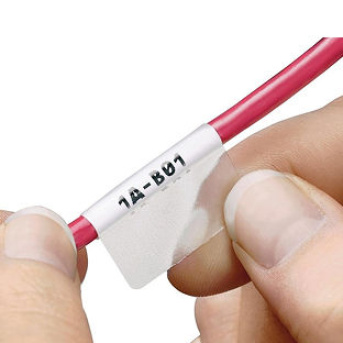 An image of a worker labeling a cable.