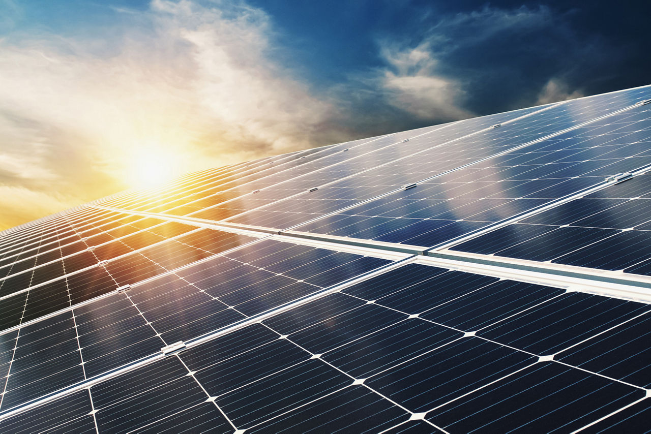 Solar panel with blue sky and sunset. concept clean energy, electric alternative, power in nature