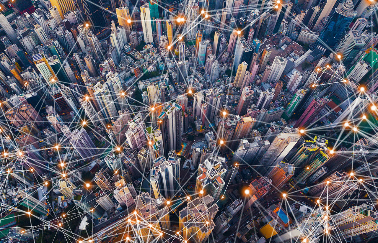 Digital network connection lines of Hong Kong Downtown. Financial district and business centers in smart city in technology concept. Top view of skyscraper and high-rise buildings. Aerial view