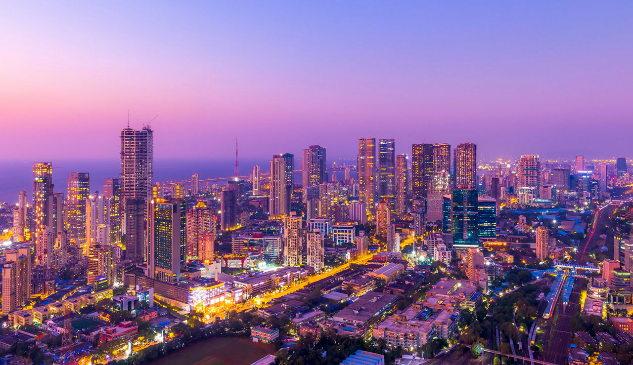 Mumbai cityscape turning purple at dusk.