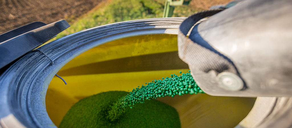 Photo - soybean seed pouring into planter