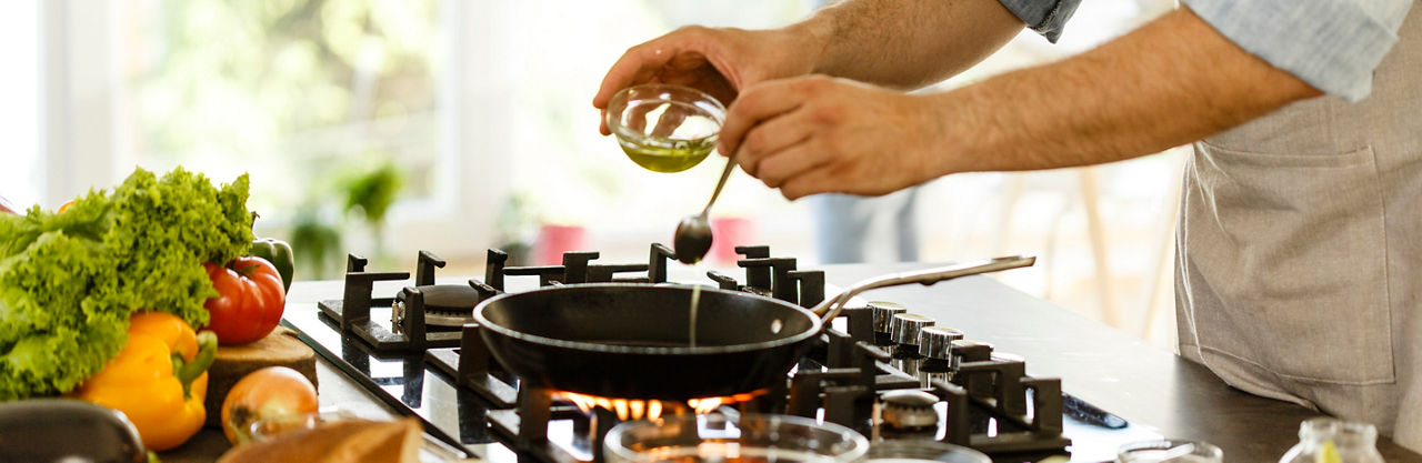 cooking with oil over stove top