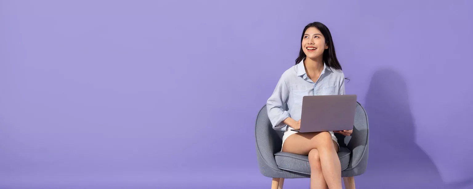 A lady talking on the phone in the office