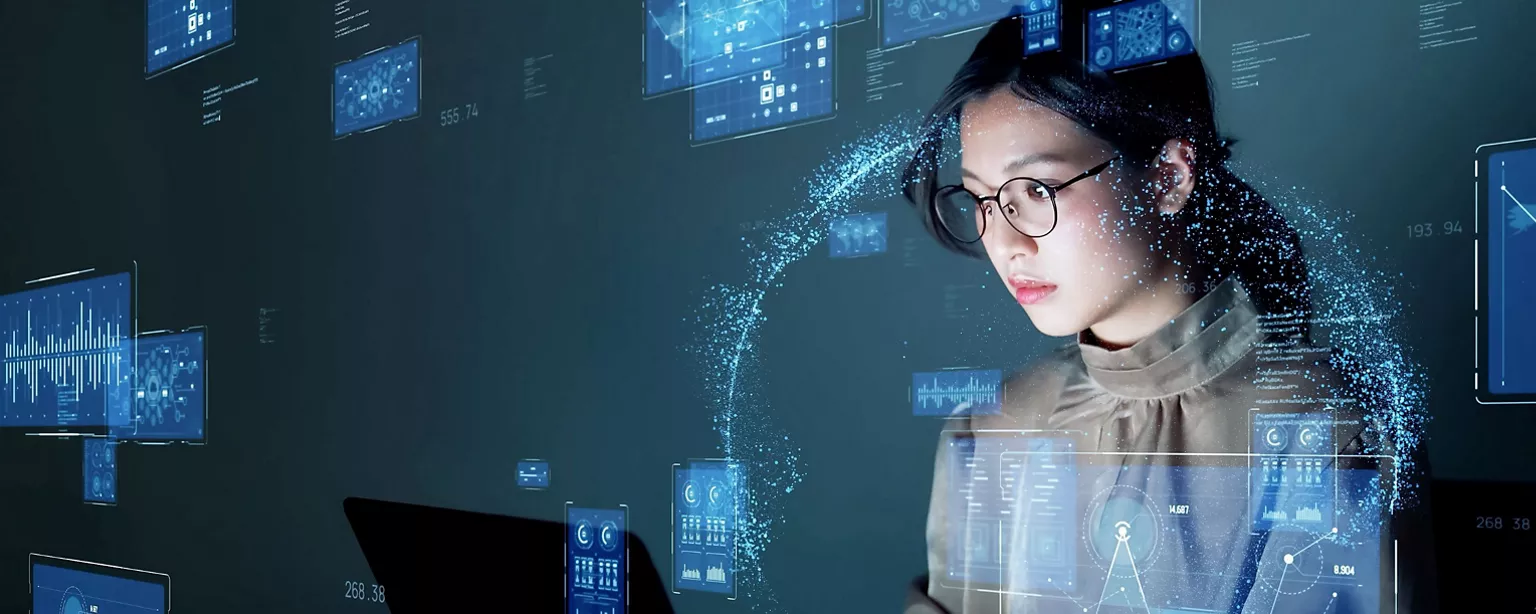 A lady using AI to process large amounts of data