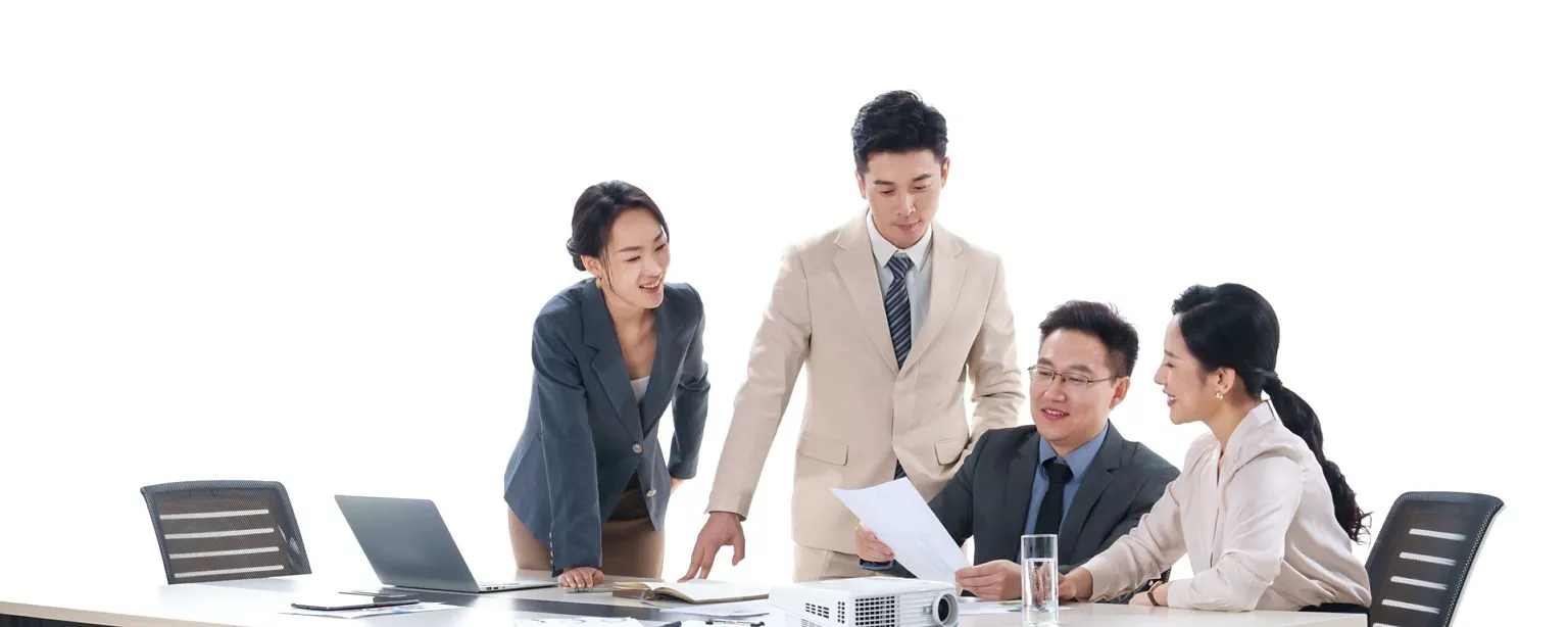 Two office ladies and two business men discussing at the table