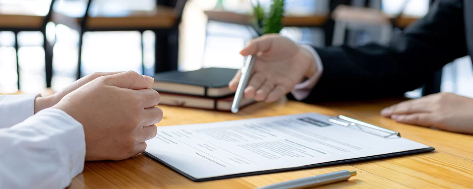 An employer and a job seeker negotiating salary