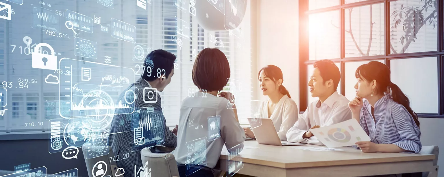 IT project manager and colleague sitting in the meeting room discussing