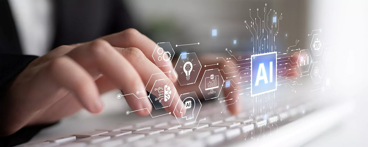 A manager is using computer and AI tools