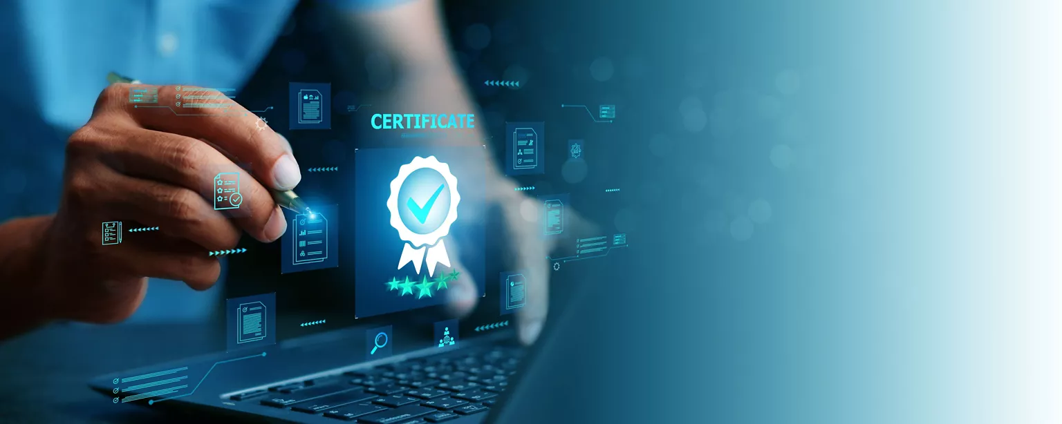 Hand of a person hover over a laptop with a certification hologram visible.
