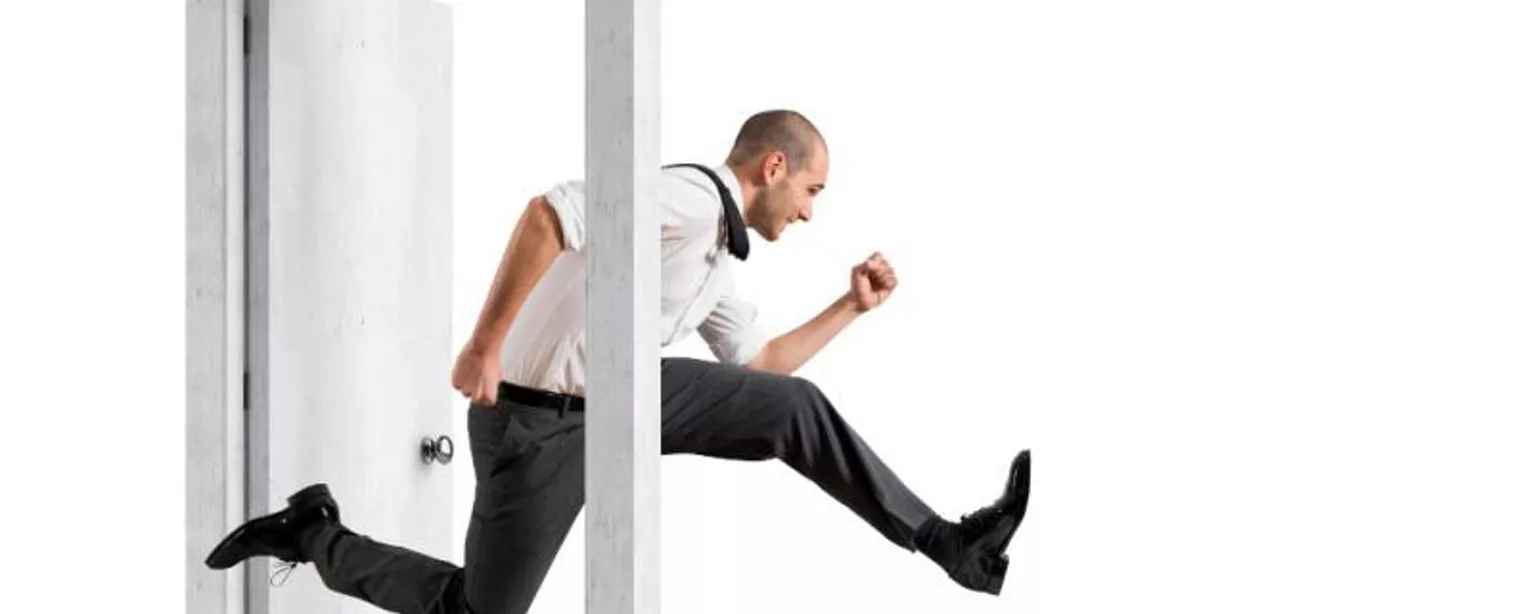 Man jumping out the door, representing employee resignation