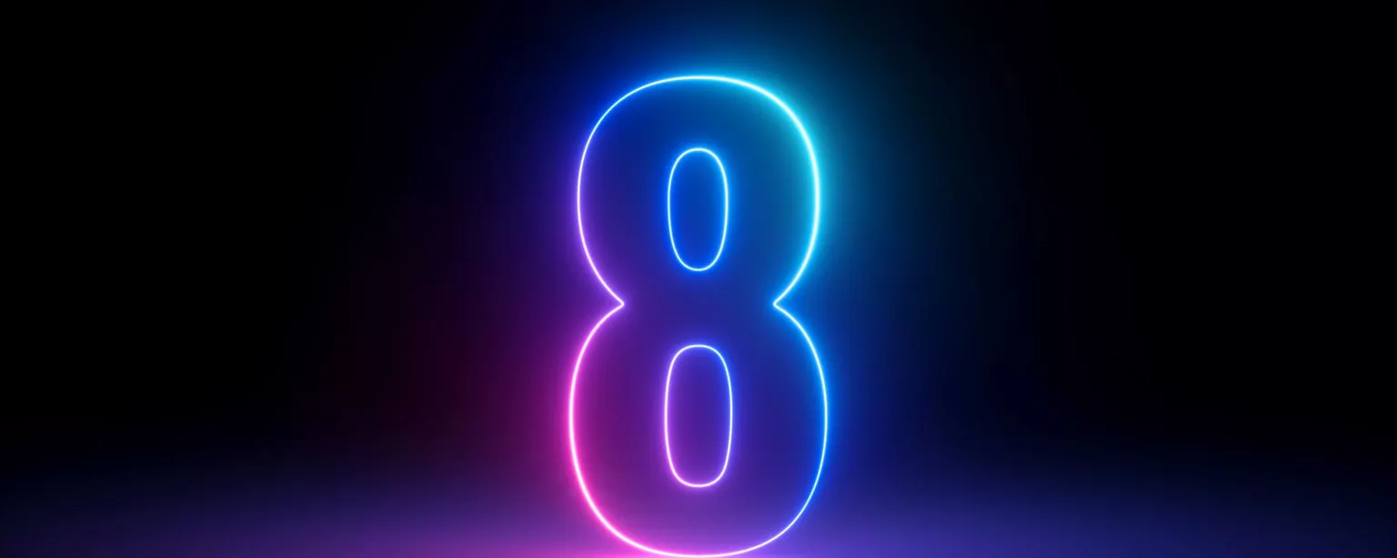 An outline of the number 8 against a dark background, lit up with blue, pink and purple hues.