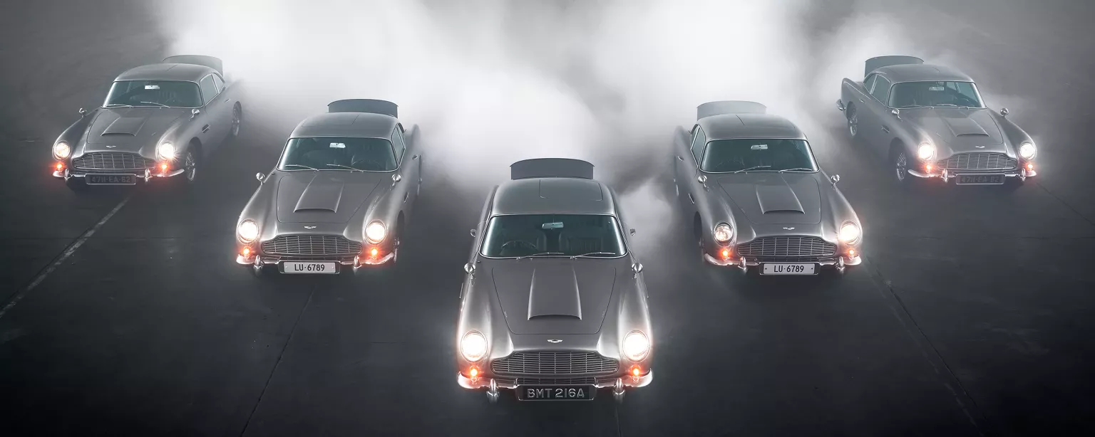 Five Aston Martin DB5 Goldfinger Continuation Cars gather in a lifetime celebration of 'the most famous car in the world'