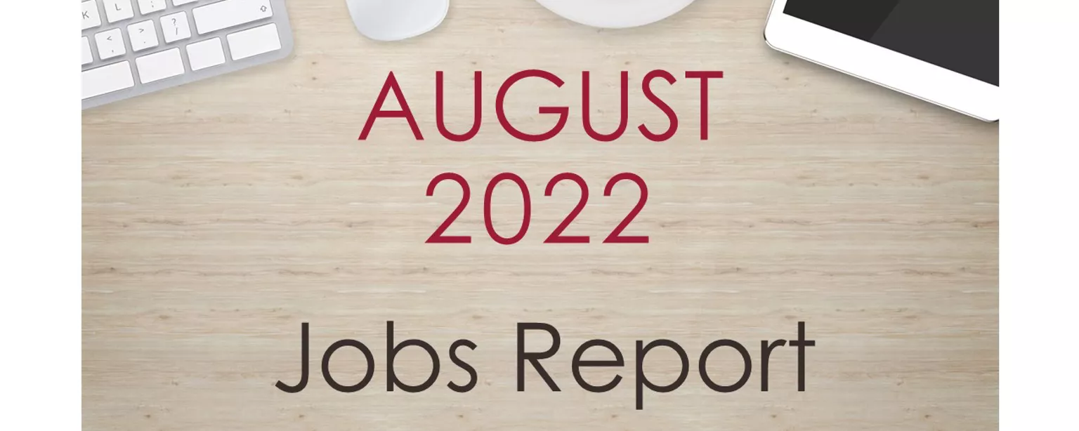 Desktop with keyboard, tablet and coffee cup, with text that reads: August 2022 Jobs Report.