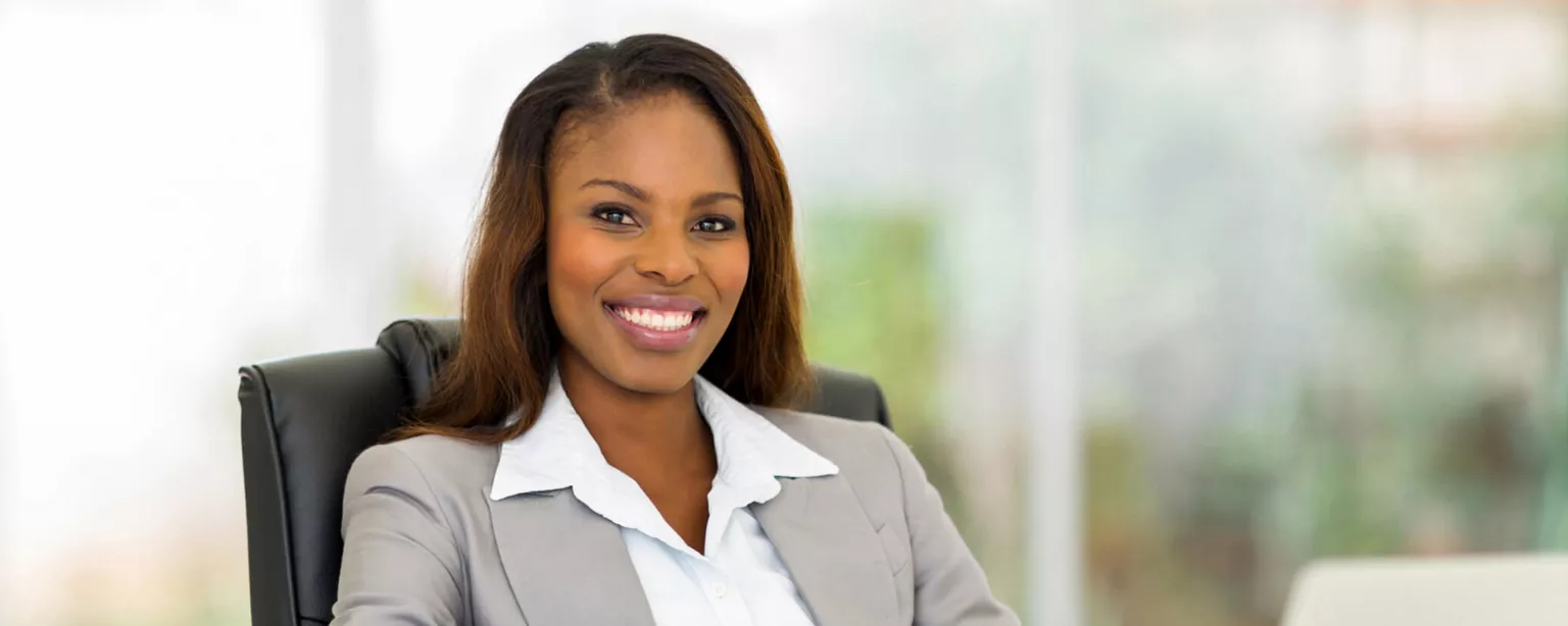 How to Find the Best Accounting Jobs — professional woman sitting at office desk