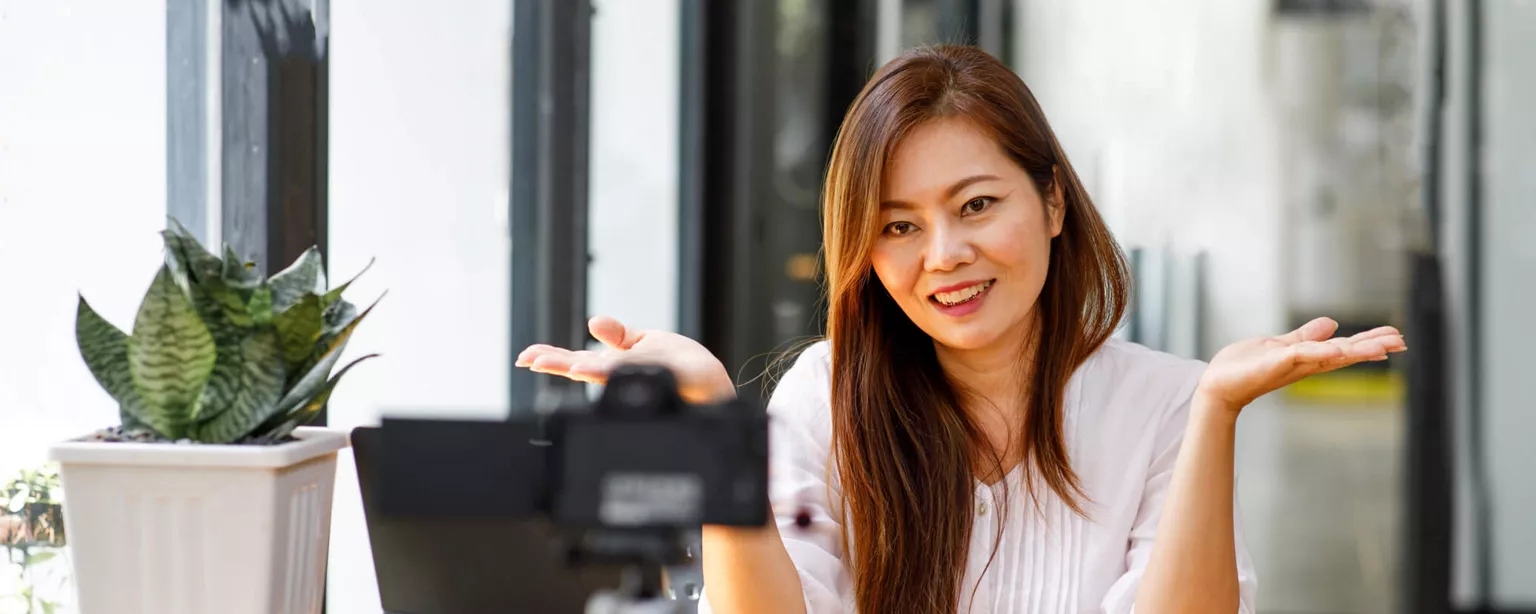 How to Prepare for a Job Interview With a Creative Agency — candidate at desk during video call