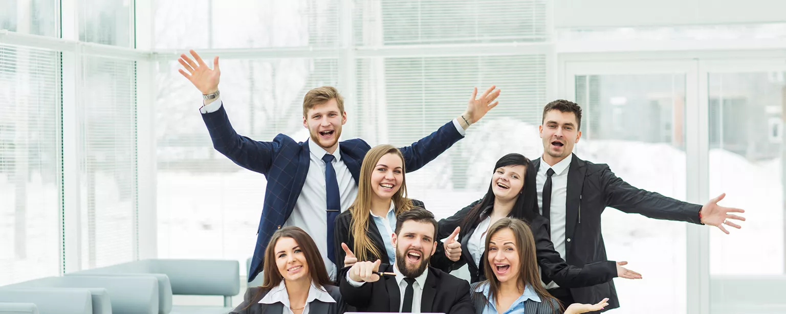 Group of people laughing, obviously enjoying fun accounting jobs