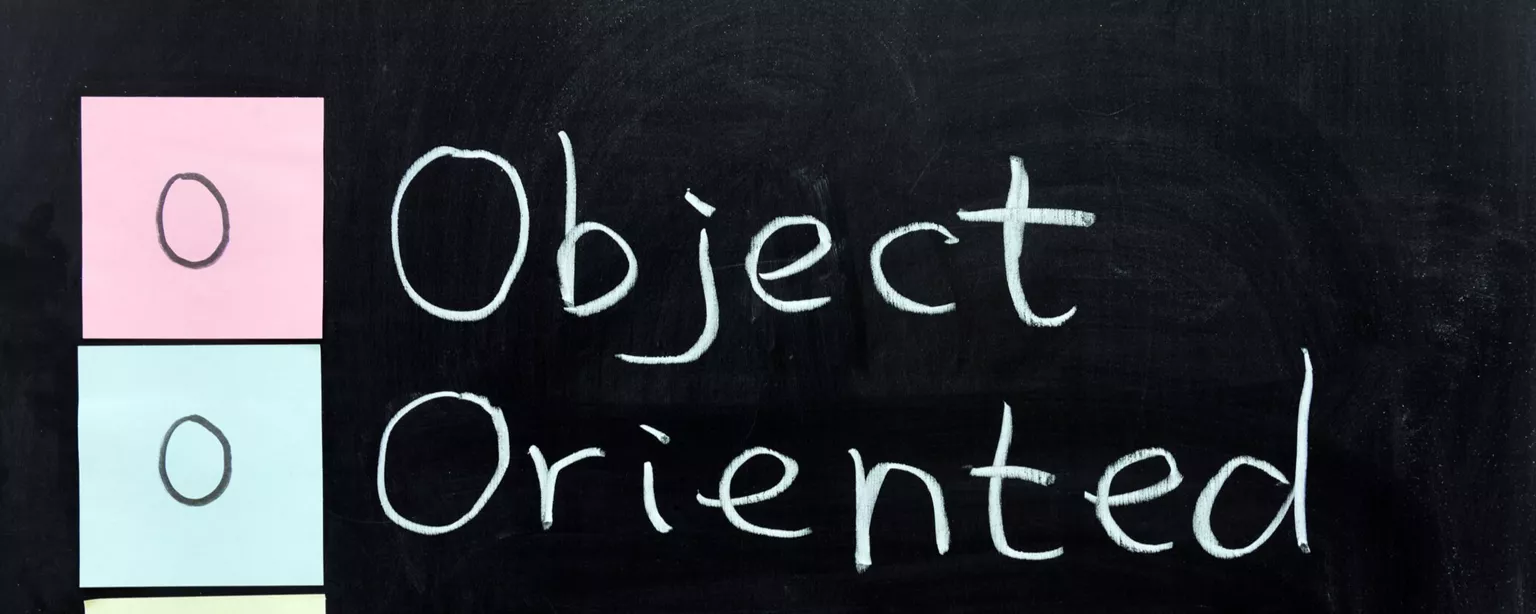 The letters "OOP" and words "Object Oriented Programming" are seen on a black background.