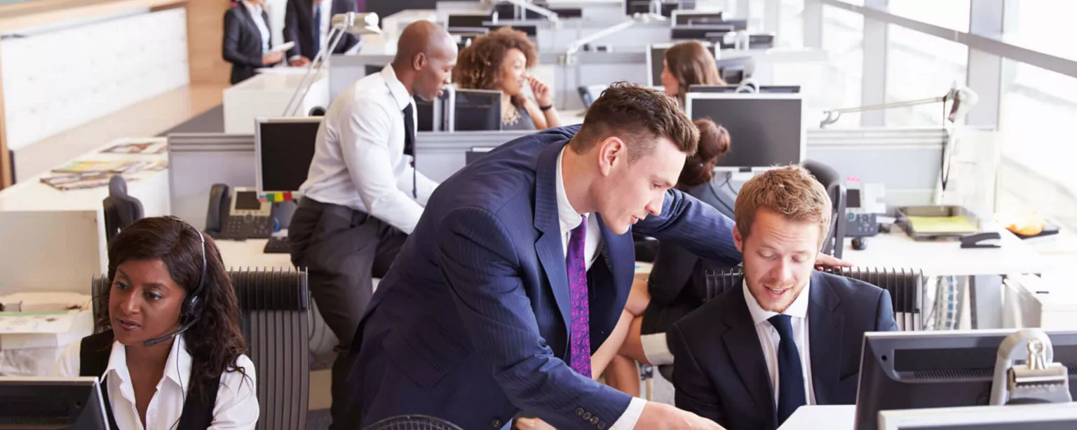 Accounting professionals working in an open office floor plan