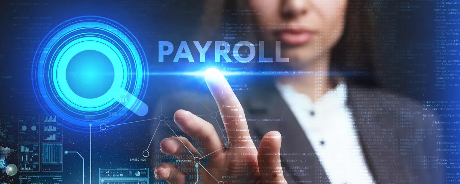 What You Should Know About the Latest in Payroll Technology — Woman pointing to word "payroll" on glass