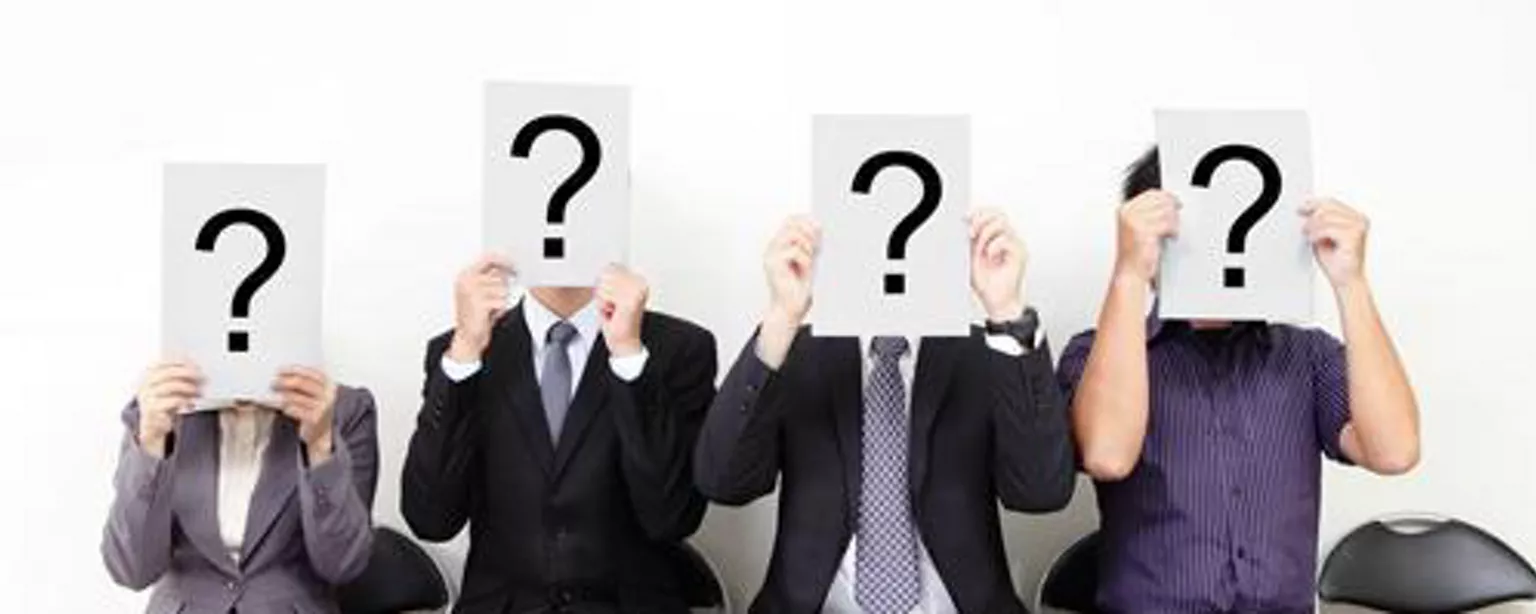 Job applicants holding question marks to ask in interview