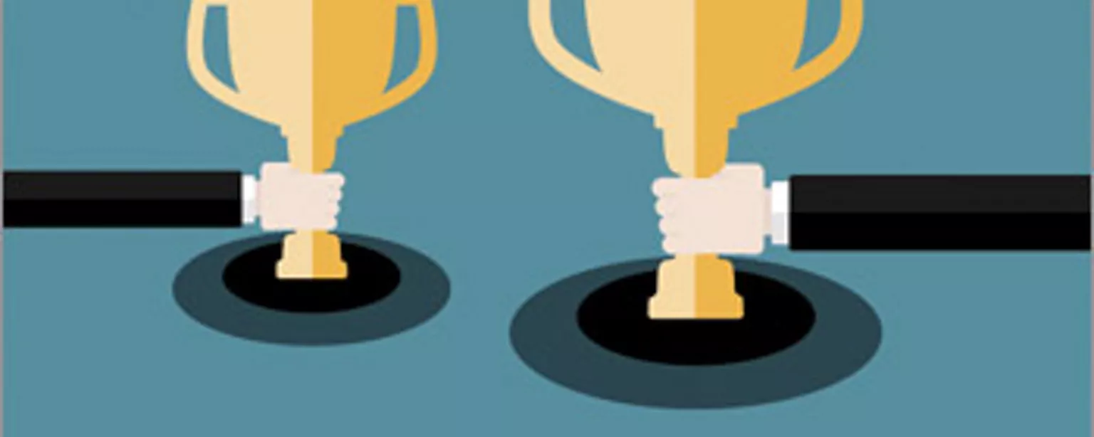 Two hands holding trophies signifying ways to acknowledge your staff