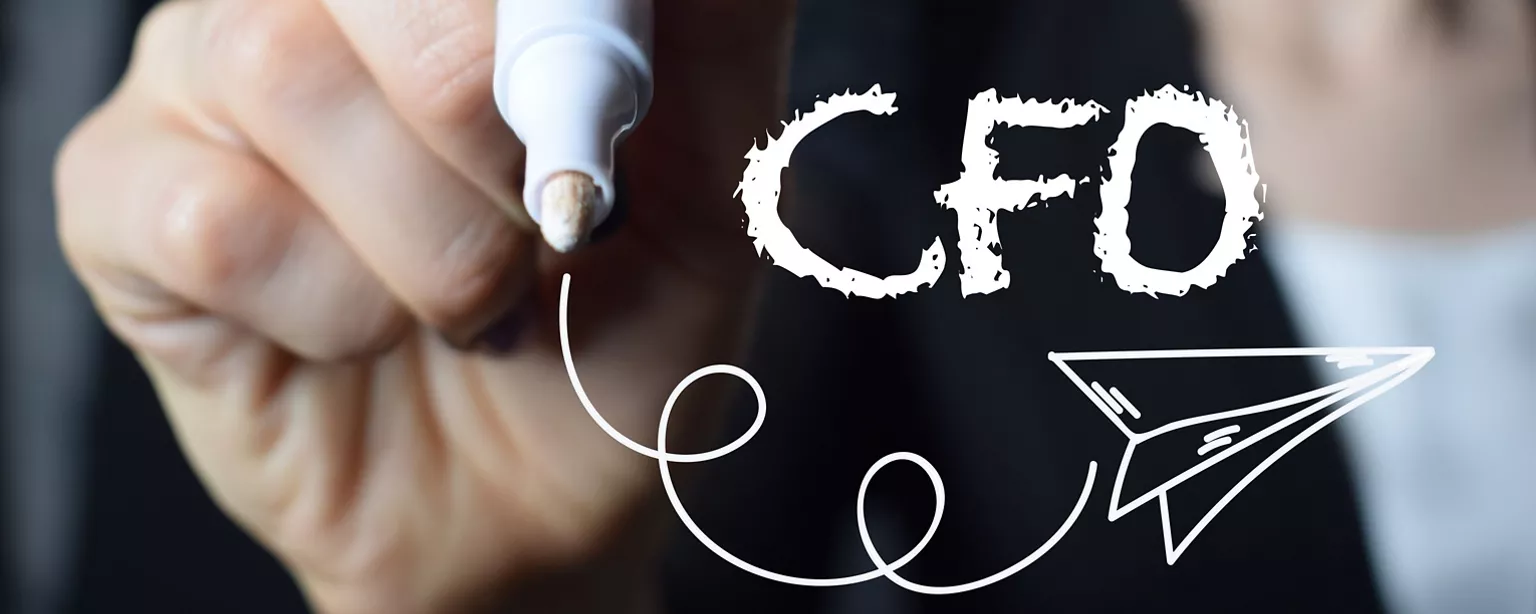 Three white cubes with the black letters "C," "F" and "O" are held between a thumb and finger against a red background.