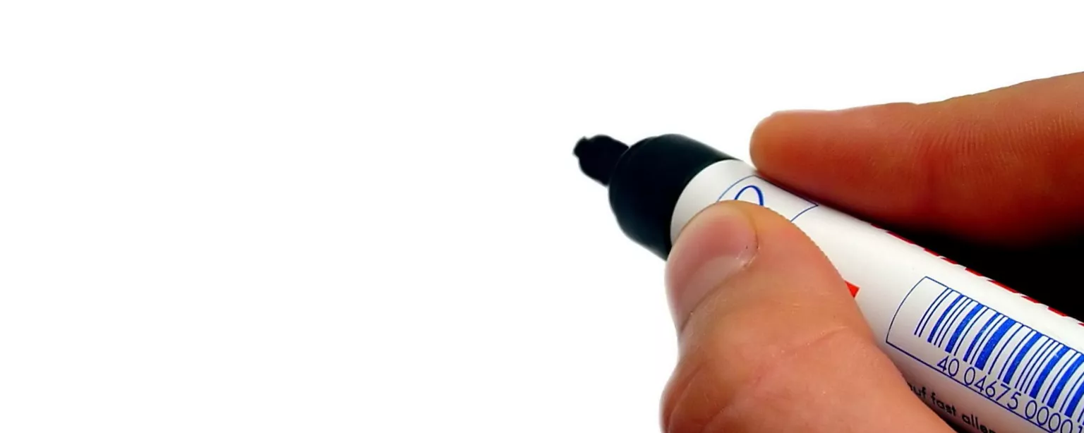 How to Win With a Staff Accountant Job Description — hand with marker and white board with words staff accountant