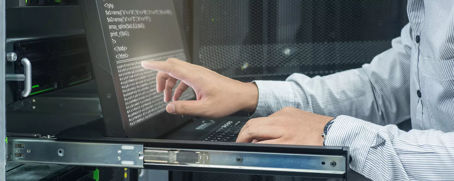 Man working on a laptop.