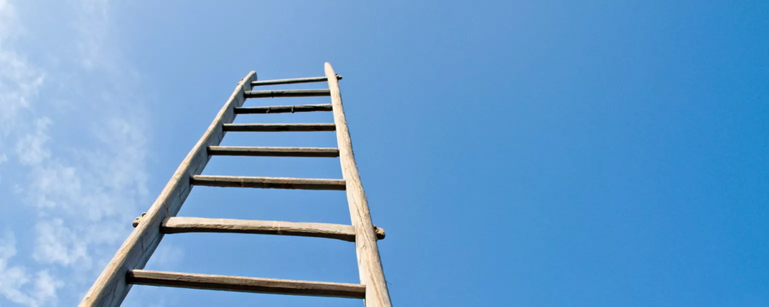 Start Your Career by Becoming an Administrative Assistant — View of ladder going up to the sky, representing an administrative assistant's career path