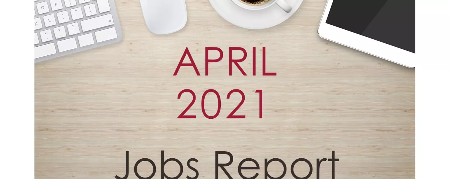 Image of a desk with text that reads, "April 2021 Jobs Report"