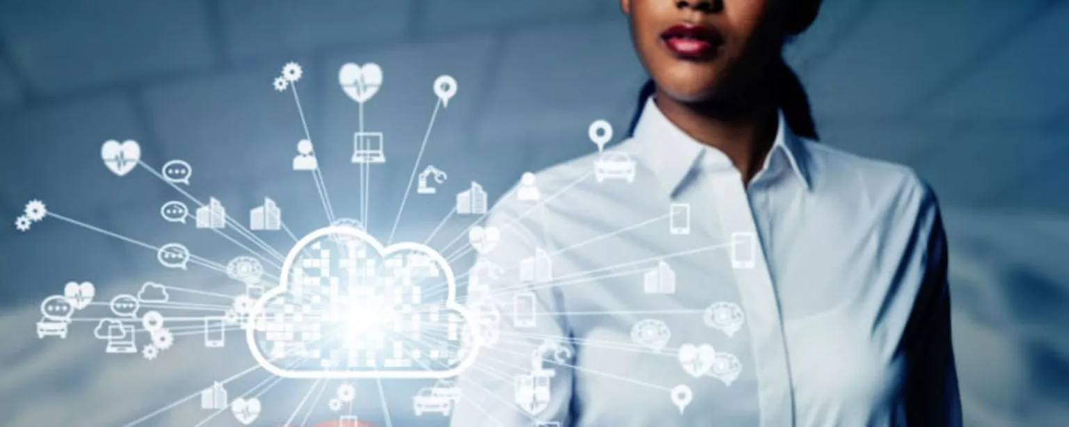 woman in white blouse standing with arm extended and her hand upholding a digital cloud image 