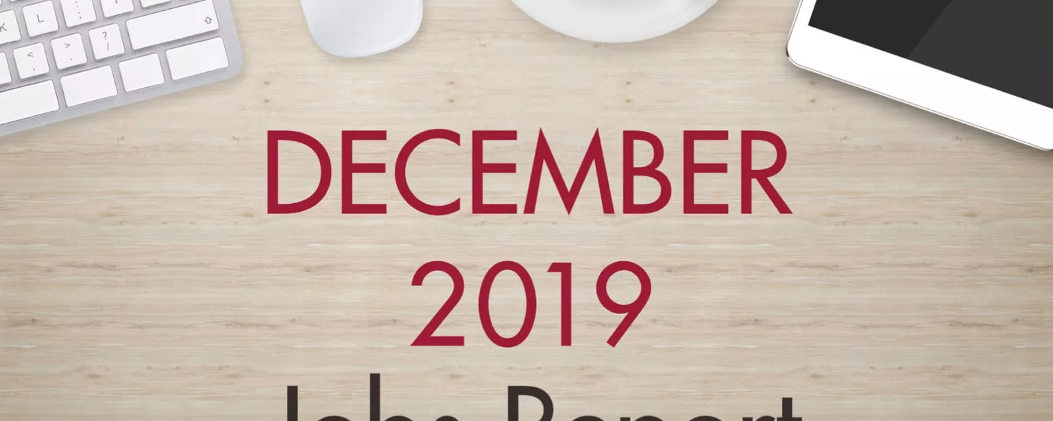 An image of a desk with text that reads, "December 2019 Jobs Report"