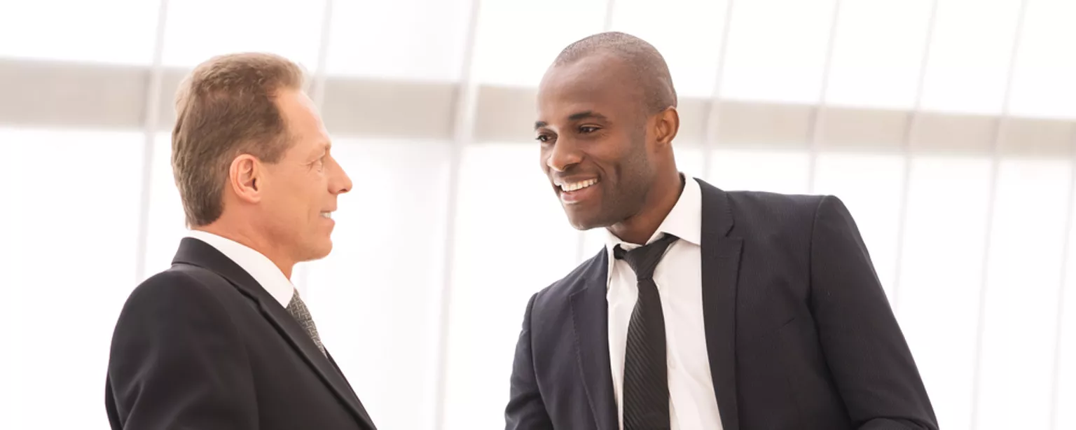 Two business professionals talking. 