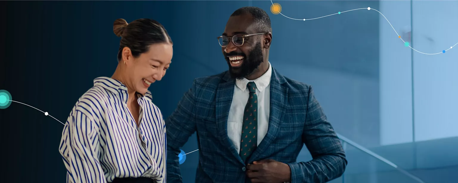 two people working in the legal profession smile and talk