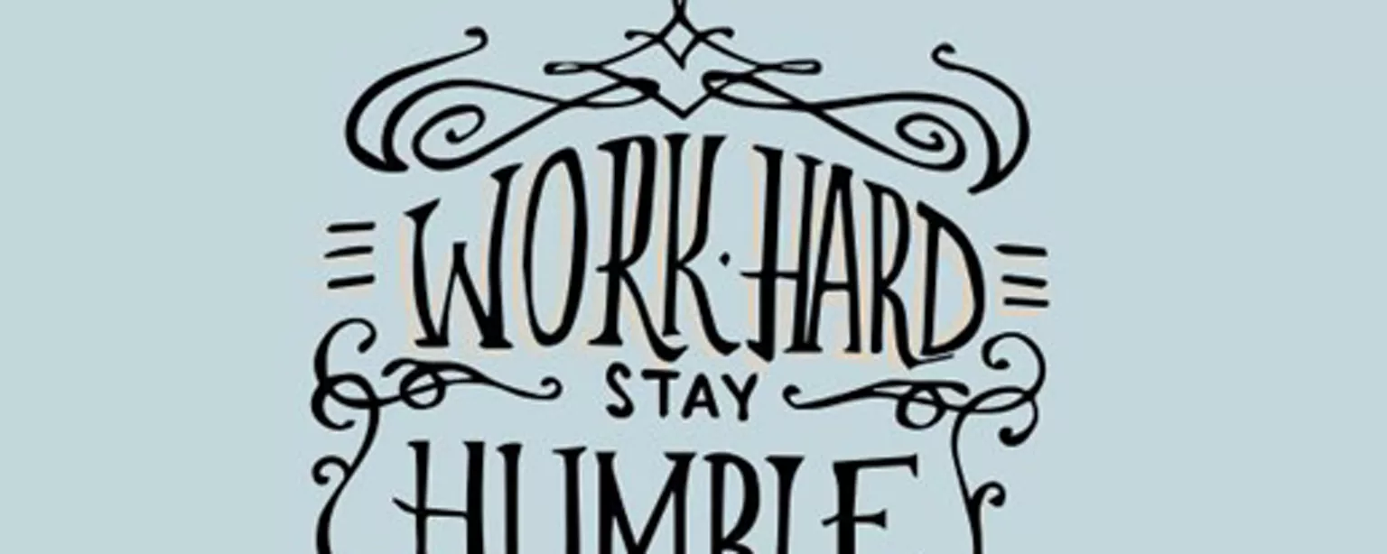 The words "Work Hard, Stay Humble" in fancy font