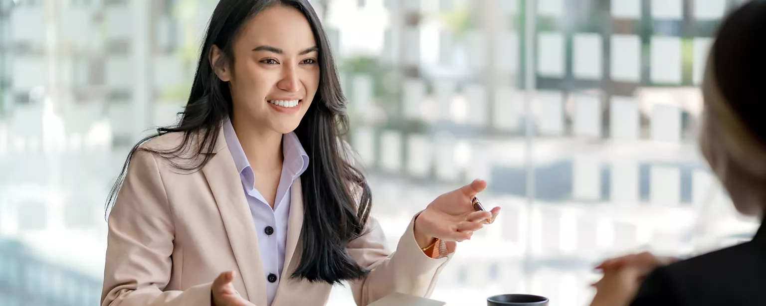 A woman who has completed a value validation project dazzles the hiring manager in a job interview.