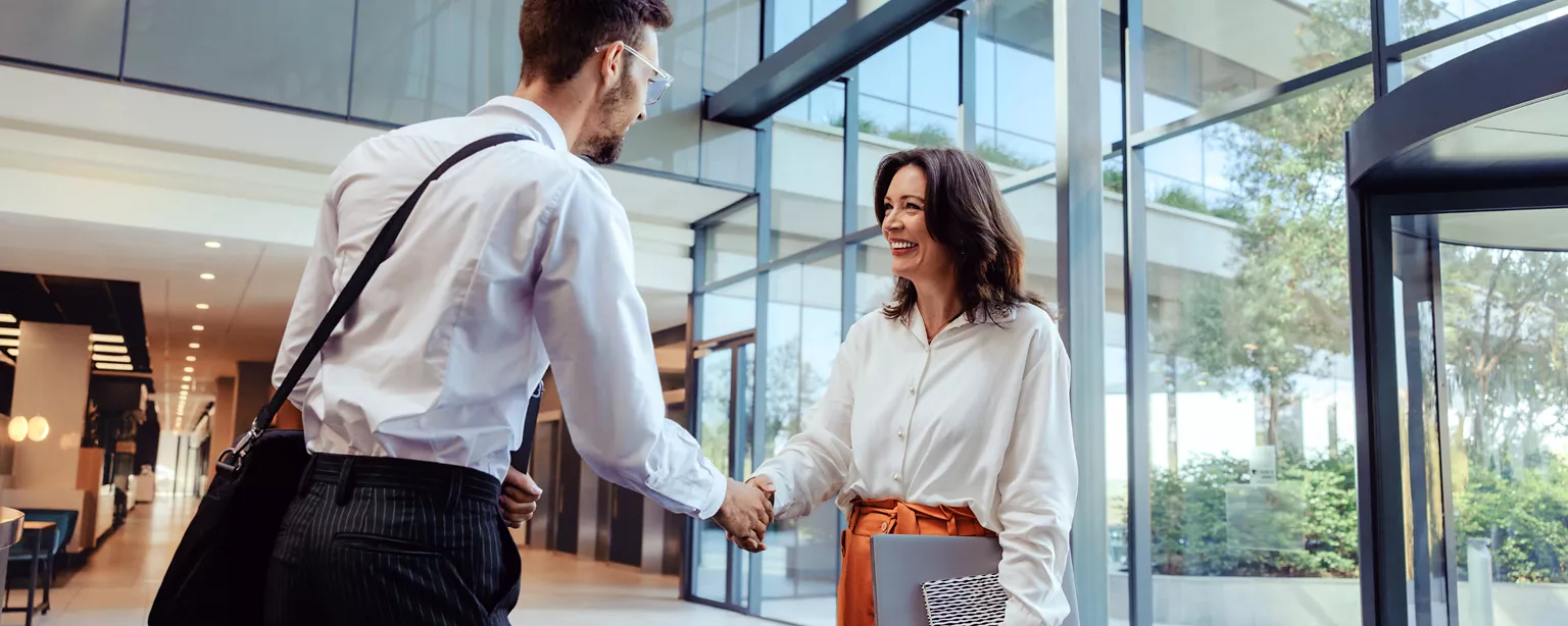 workers in an office talking