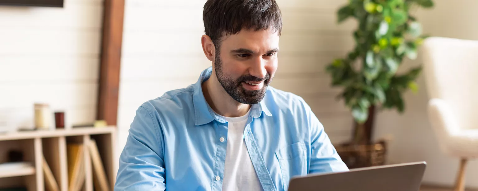 Man working from home at his laptop