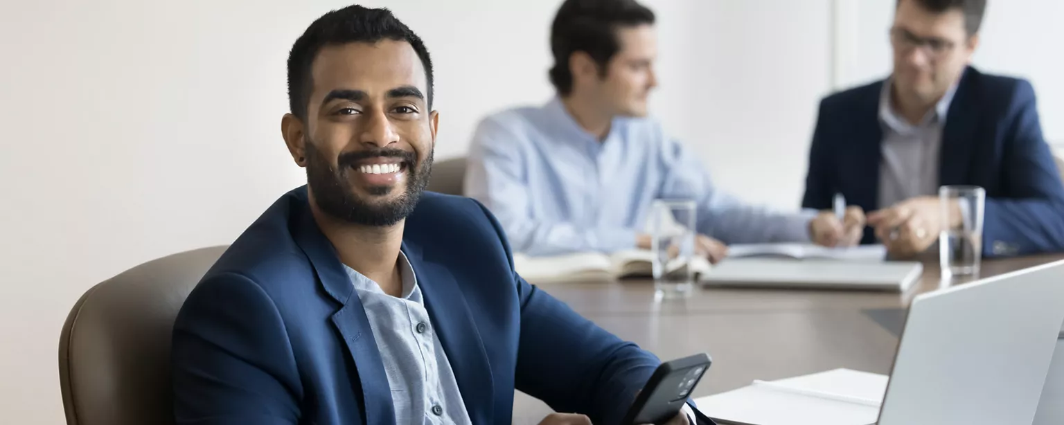 office worker smiling at camera