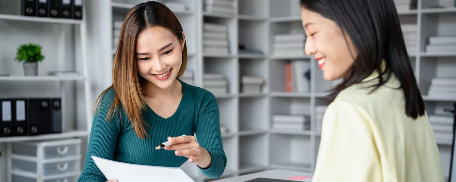 two women in a performance appraisal review