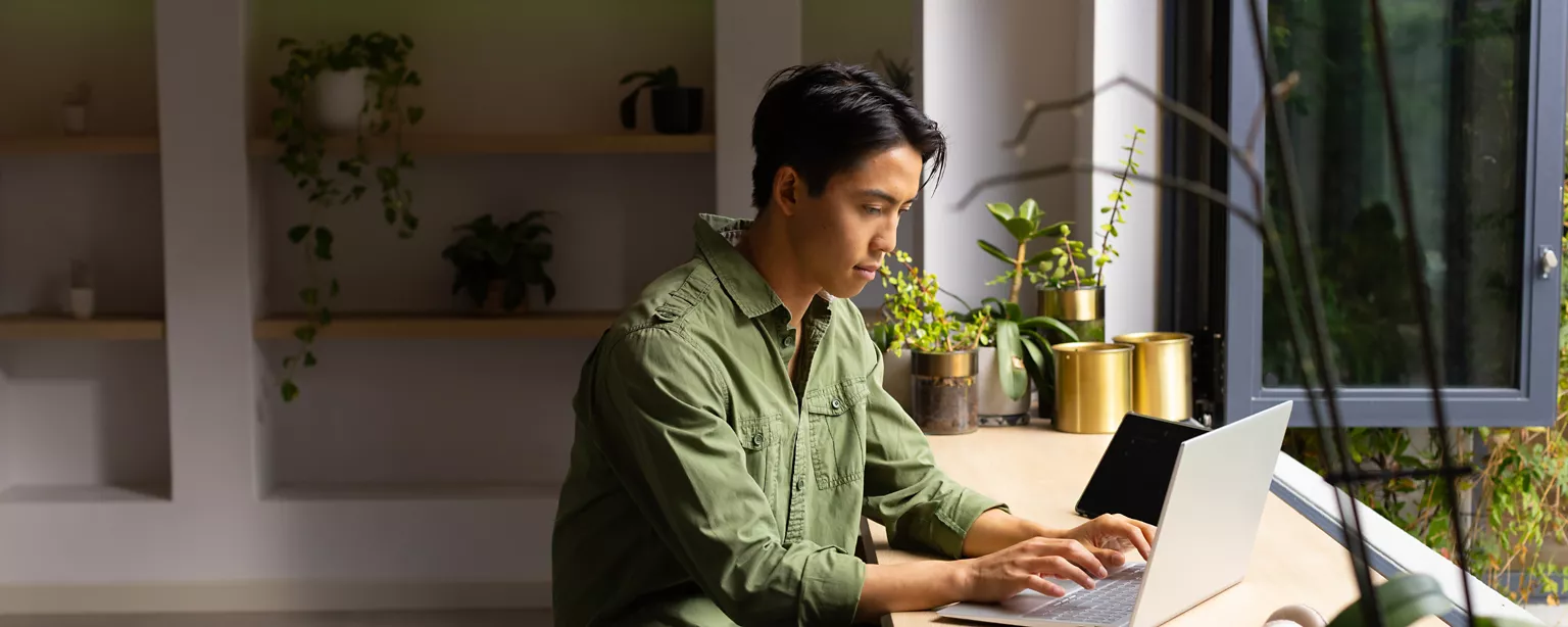 Man writing his resume