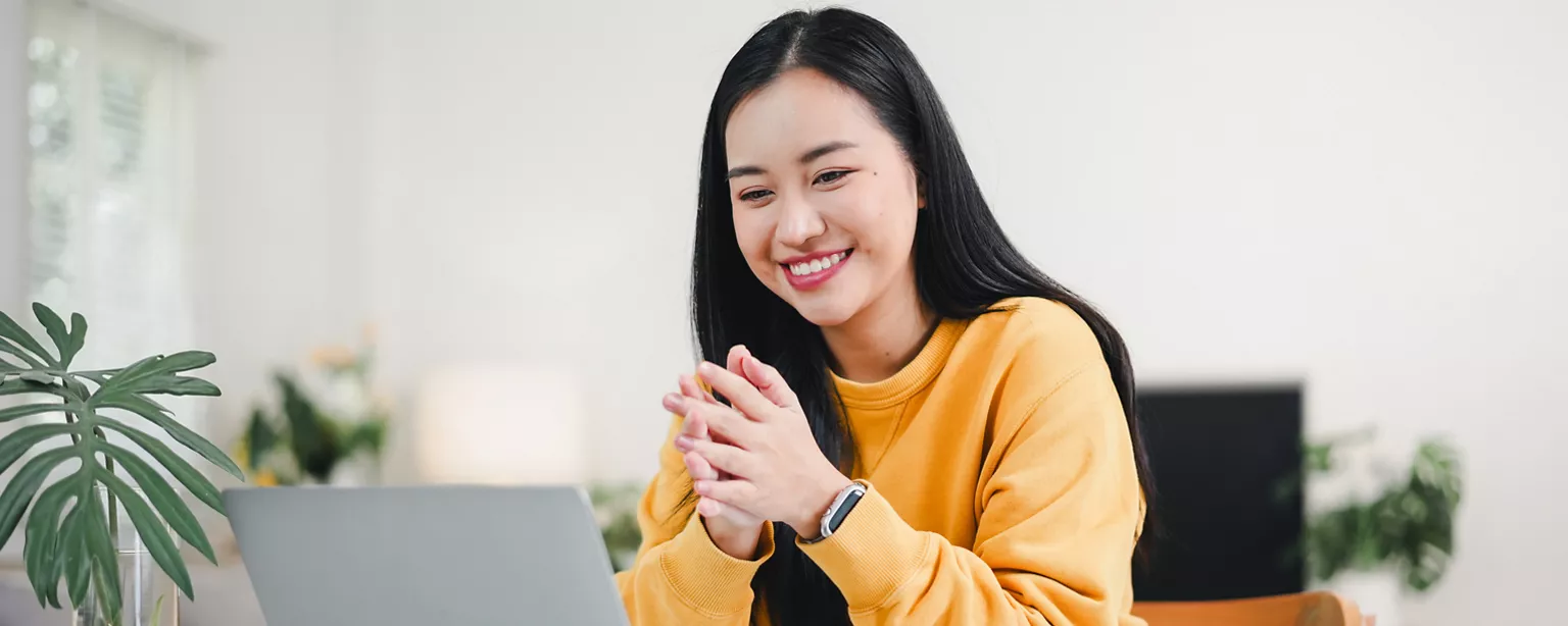 Woman writing a resume