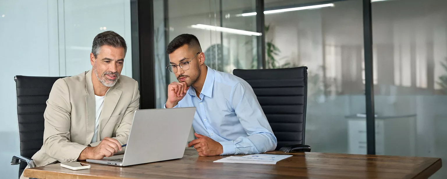 two businessmen in a work performance review