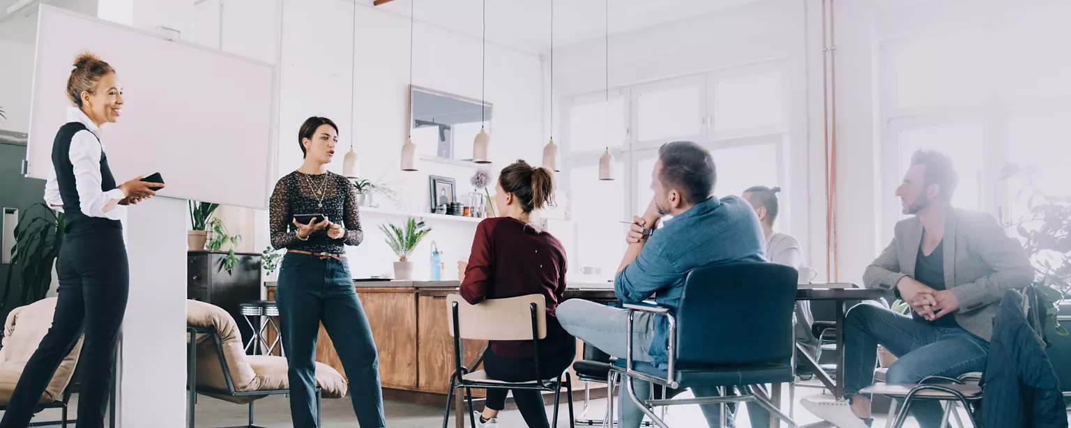 Future of work in Canada with a team of employees learning and upskilling