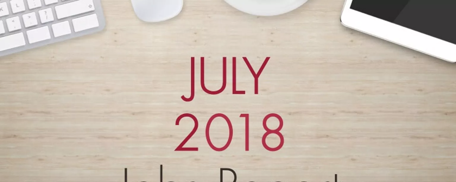 July 2018 Jobs Report. An image of a desk with text that reads, "July 2018 Jobs Report"