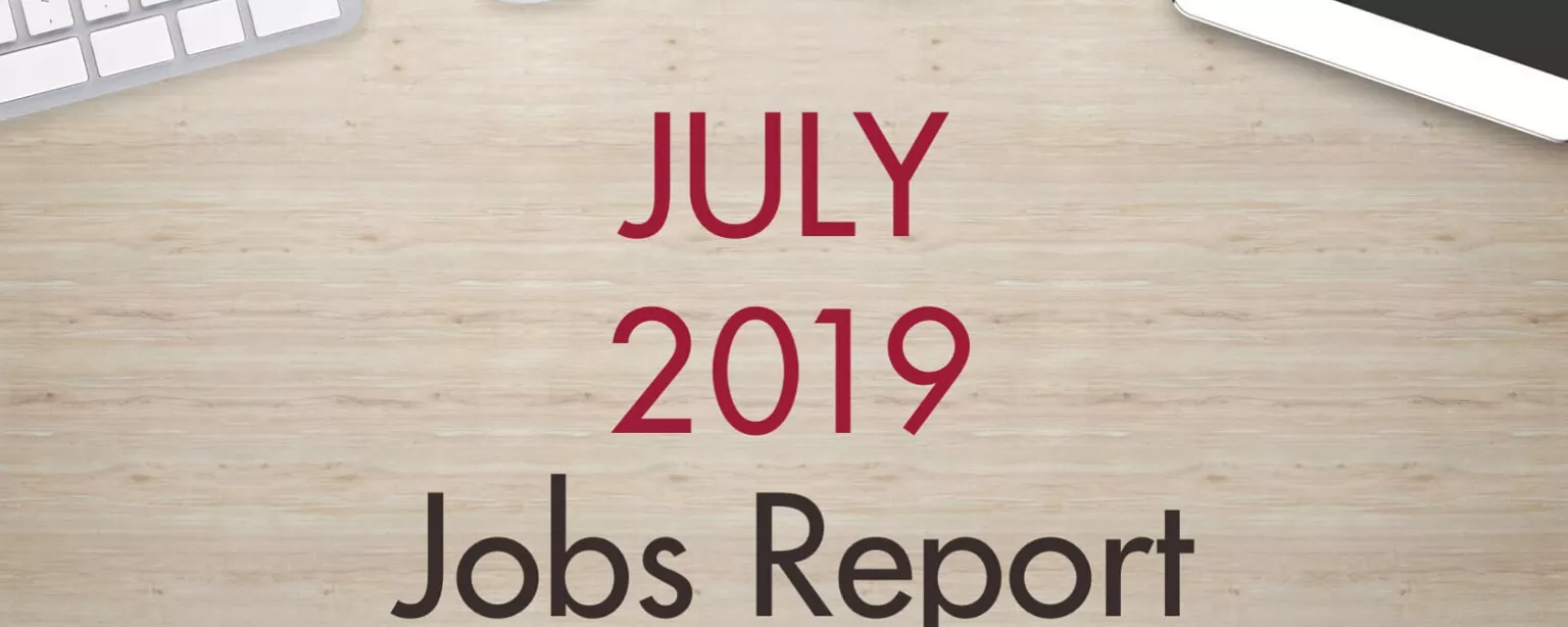 An image of a desk with text that reads, "July 2019 Jobs Report"
